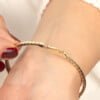 Secure Clasp on Elegant Half-Eternity 14K Gold Tennis Bracelet with Moissanite on Wrist