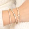 Stackable Bracelets with Pastel Clover Designs and Moissanite Stones